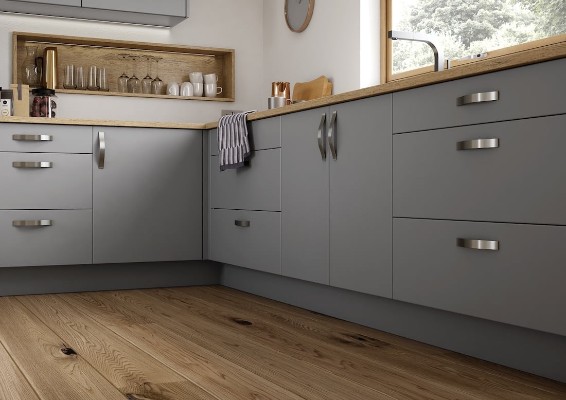 Modern grey luxury kitchen with silver handles